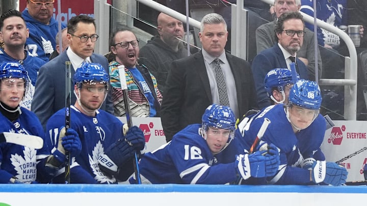 Apr 13, 2024; Toronto, Ontario, CAN; Detroit Toronto Maple Leafs head coach Sheldon Keefe  follows the play against the Detroit Red Wings during the third period at Scotiabank Arena. Mandatory Credit: Nick Turchiaro-Imagn Images