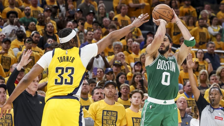 May 27, 2024; Indianapolis, Indiana, USA; Boston Celtics forward Jayson Tatum (0) shoots the ball during game four of the eastern conference finals for the 2024 NBA playoffs at Gainbridge Fieldhouse. Mandatory Credit: Trevor Ruszkowski-USA TODAY Sports