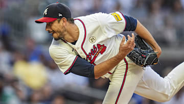 Sep 15, 2024; Cumberland, Georgia, USA; Atlanta Braves starting pitcher Charlie Morton (50) pitches against the Los Angeles Dodgers during the first inning at Truist Park. Mandatory Credit: Dale Zanine-Imagn Images