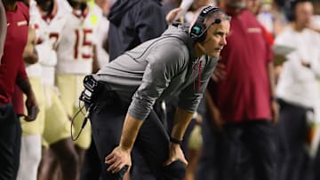 Oct 26, 2024; Miami Gardens, Florida, USA; Florida State Seminoles head coach Mike Norvell watches from the sideline against the Miami Hurricanes during the second quarter at Hard Rock Stadium. Mandatory Credit: Sam Navarro-Imagn Images