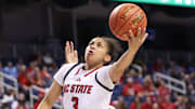 Mar 7, 2025; Greensboro, NC, USA;  NC State Wolfpack guard Zamareya Jones (3) goes to the basket during the third quarter against Georgia Tech Yellow Jackets at First Horizon Coliseum. Mandatory Credit: Cory Knowlton-Imagn Images