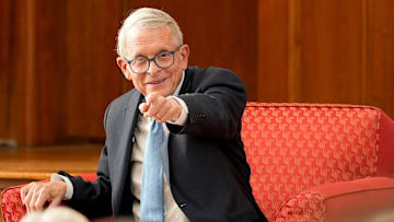 Ohio Gov. Mike DeWine is introduced at the start of an event at the University of Cincinnati's Portman Center for Policy Solutions in Cincinnati on Tuesday, Oct. 21, 2025.