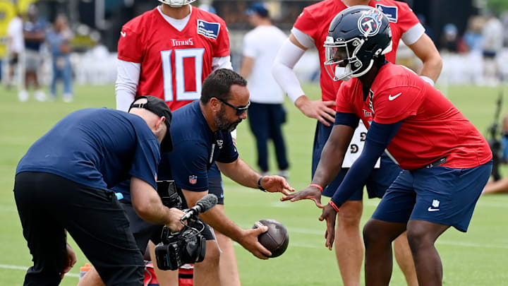 Tennessee Titans quarterback Cam Ward (1) takes a snap during an NFL football minicamp camp practice at Ascension Saint Thomas Sports Park Thursday, June 12, 2025, in Nashville, Tenn. Tennessee Titans quarterback Cam Ward (1) takes a snap during an NFL football minicamp camp practice at Ascension Saint Thomas Sports Park Thursday, June 12, 2025, in Nashville, Tenn.