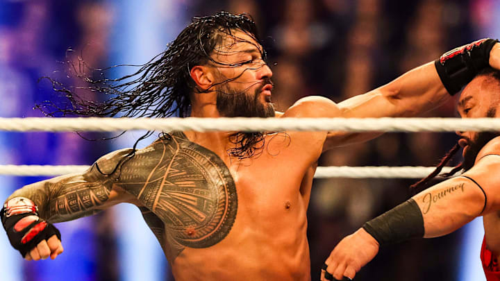 WWE superstar Roman Reigns throws a punch at Jacob Fatu on Saturday, Feb. 1, 2025, during the WWE Royal Rumble