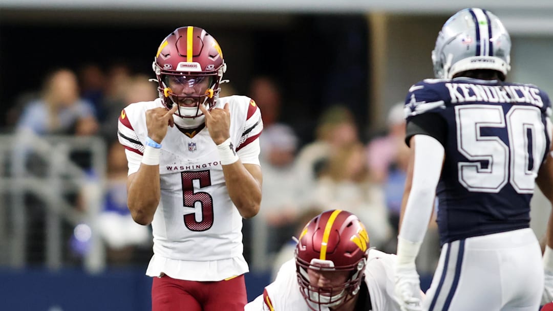 Washington Commanders quarterback Jayden Daniels calls a play against the Dallas Cowboys during the second quarter at AT&T Stadium. 