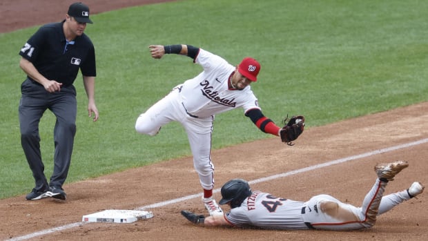 Tyler Fitzgerald steals third base