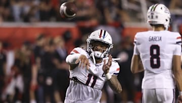 Sep 28, 2024; Salt Lake City, Utah, USA; Arizona Wildcats quarterback Noah Fifita (11) warms up before a game against the Utah Utes at Rice-Eccles Stadium. Mandatory Credit: Rob Gray-Imagn Images
