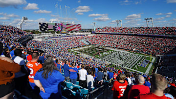The Florida and Georgia marching bands share the field during Saturday's pregame show. The Florida Gators went into the half trailing the Georgia Bulldogs 24 to 0. The Florida Gators were the home team for this years annual Florida vs Georgia college football rivalry game at TIAA Bank field in Jacksonville, Florida Saturday, October 30, 2021. [Bob Self/Florida Times-Union]