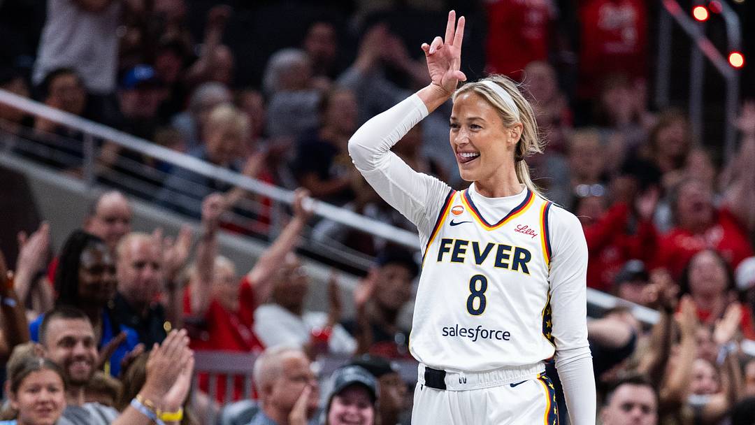 Jun 16, 2026; Indianapolis, Indiana, USA;  Indiana Fever guard Sophie Cunningham (8) celebrates a made shot in the first half against the Toronto Tempo at Gainbridge Fieldhouse. Mandatory Credit: Trevor Ruszkowski-Imagn Images