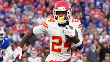 Nov 2, 2025; Orchard Park, New York, USA; Kansas City Chiefs running back Brashard Smith (24) runs the ball in the first quarter against the Buffalo Bills at Highmark Stadium. 