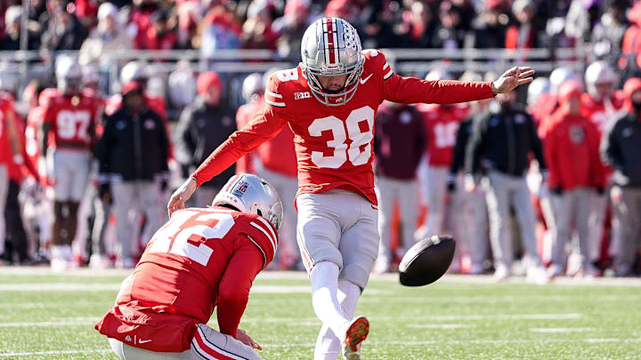 Ohio State place kicker Jayden Fielding (38) attempts a field goal against Michigan during the first half at Ohio Stadium in Columbus, Ohio on Saturday, Nov. 30, 2024.