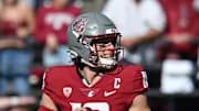 Oct 19, 2024; Pullman, Washington, USA; Washington State Cougars quarterback John Mateer (10) drops back for a pass against the Hawaii Warriors during the first half at Gesa Field at Martin Stadium. Mandatory Credit: James Snook-Imagn Images