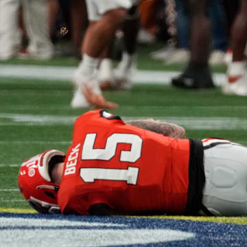 Carson Beck sat out the entire second half before returning in overtime for one final handoff to clinch the SEC title.