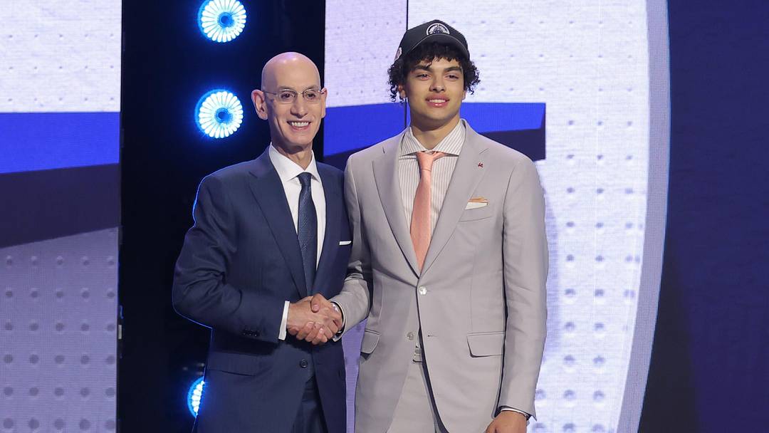 Jun 23, 2026; New York, NY, USA; NBA commissioner Adam Silver greets the fifth pick in the 2026 NBA draft, Illinois guard Keaton Wagler after he was selected by the Los Angeles Clippers at Barclays Center. Mandatory Credit: Brad Penner-Imagn Images