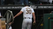 Pittsburgh Pirates starting pitcher Paul Skenes walks into the dugout.