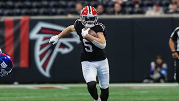 Dec 22, 2024; Atlanta, Georgia, USA; Atlanta Falcons wide receiver Drake London (5) runs after a catch against the New York Giants in the third quarter at Mercedes-Benz Stadium. Mandatory Credit: Brett Davis-Imagn Images
