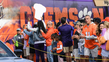 Sep 24, 2022; Winston-Salem, NC, USA; Clemson fans cheer as the team bus arrives before the game with Wake Forest at Truist Field in Winston-Salem, North Carolina Saturday, September 24, 2022.   Mandatory Credit: Ken Ruinard-USA TODAY Sports