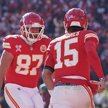 Kansas City Chiefs tight end Travis Kelce celebrates with quarterback Patrick Mahomes 