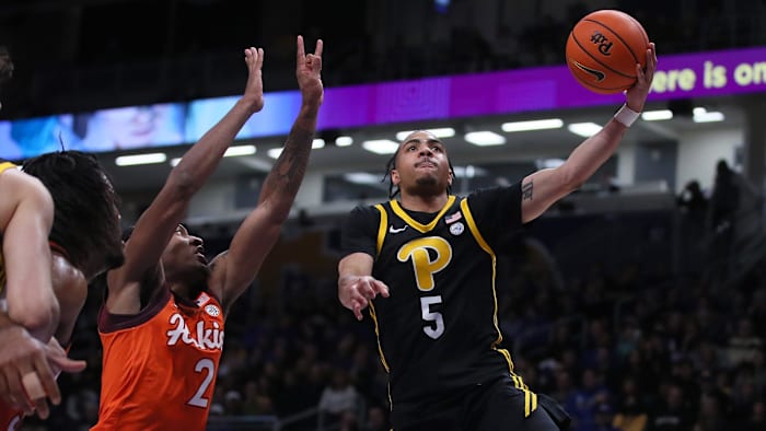 Pittsburgh Panthers Ishmael Leggett (5) goes for a layup after getting around Virginia Tech Hokies