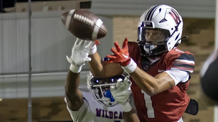 Temple Wildcats center back Jason Bradford deflects the pass intended for Weiss Wolves wide receiver Adrian Wilson (1) during the second quarter at the District 12-6A football game on Friday, Sept 29,20 2023, at the Pfield Stadium - Pflugerville, TX.