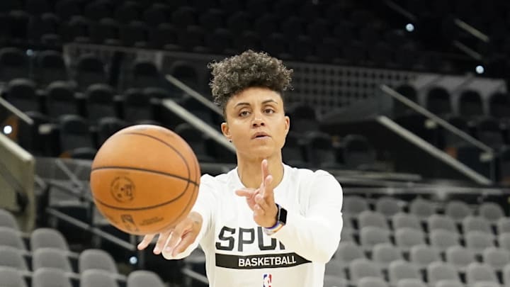 Oct 13, 2022; San Antonio, Texas, USA; San Antonio Spurs player development assistant Candice Dupree warms up players before a game against the Oklahoma City Thunder at AT&T Center. Mandatory Credit: Scott Wachter-Imagn Images Oct 13, 2022; San Antonio, Texas, USA; San Antonio Spurs player development assistant Candice Dupree warms up players before a game against the Oklahoma City Thunder at AT&T Center. Mandatory Credit: Scott Wachter-Imagn Images