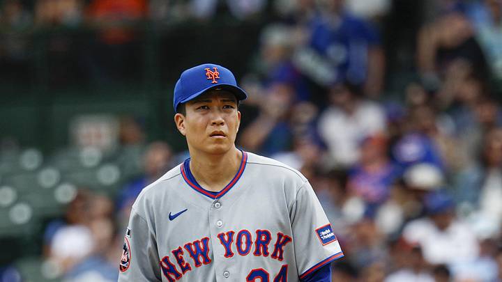 Apr 17, 2026; Chicago, Illinois, USA; New York Mets starting pitcher Kodai Senga (34) delivers a pitch against the Chicago Cubs during the first inning at Wrigley Field. Mandatory Credit: Kamil Krzaczynski-Imagn Images
