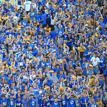 Pittsburgh Panthers student section erupts after they display the Panthers 2021 ACC Championship banner during the first half of the Backyard Brawl against West Virginia at Acrisure Stadium in Pittsburgh, PA on September 1, 2022.

Pitt Vs West Virginia Backyard Brawl