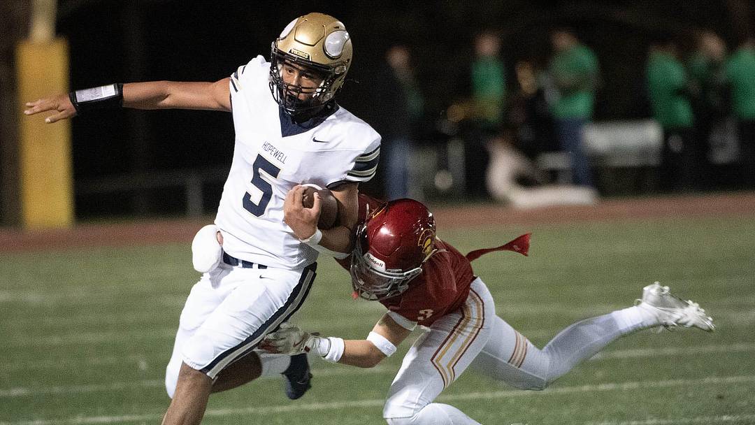 Hopewell’s James Armstrong escapes North Catholic’s Louie Iaquinta during Friday’s game at J.C. Stone Field. Hopewell’s James Armstrong escapes North Catholic’s Louie Iaquinta during Friday’s game at J.C. Stone Field.