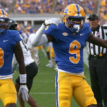 Pittsburgh Panthers Konata Mumpfield (9) reacts after scoring a touchdown during the first half against the Cincinnati Bearcats at Acrisure Stadium in Pittsburgh, PA on September 9, 2023