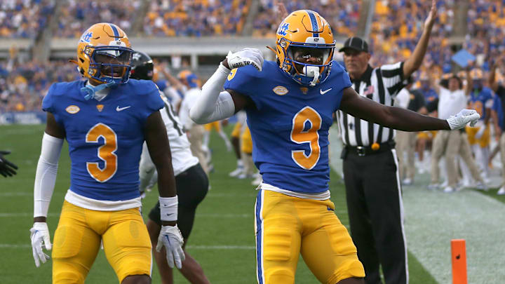 Pittsburgh Panthers Konata Mumpfield (9) reacts after scoring a touchdown during the first half against the Cincinnati Bearcats at Acrisure Stadium in Pittsburgh, PA on September 9, 2023