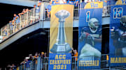 Former Pittsburgh Panthers including first round draft pick Kenny Pickett unveil the Panthers 2021 ACC Championship banner during the first half of the Backyard Brawl against the West Virginia Mountaineers at Acrisure Stadium in Pittsburgh, PA on September 1, 2022.

Pitt Vs West Virginia Backyard Brawl