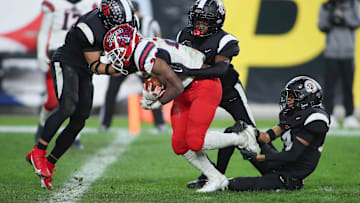 McKeesport's Kemon Spell, seen here playing against Aliquippa in the 2023 WPIAL Class 4A title game at Acrisure Stadium. Spell broke the Tigers' rushing record Friday night and will get another shot against Aliquippa at Pine-Richland next Saturday.