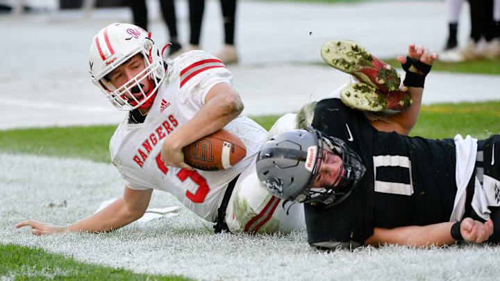 Fort Cherry quarterback Matt Sieg, left, was recently voted as the recipient of the fifth annual Willie Thrower Award, which is voted on annually to honor the top quarterback in Southwest Pennsylvania. Sieg has passed and rushed for more than 1,000 yards in the previous three seasons. 