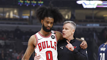 Jan 10, 2025; Chicago, Illinois, USA; Chicago Bulls head coach Billy Donovan talks to guard Coby White (0) during the first half of a basketball game against the Washington Wizards at United Center. Mandatory Credit: Kamil Krzaczynski-Imagn Images