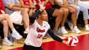 Nebraska outside hitter Taylor Landfair had eight kills and two aces to help Nebraska hold off No. 22 Utah.
