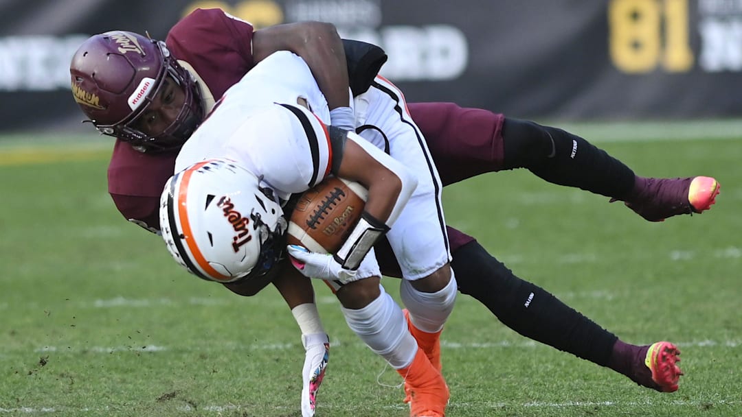 Beaver Falls' Trey Singleton is tackled by Steel Valley's Da'ron Barksdale during Friday's Class 2A WPIAL championship game at Acrisure Stadium.

Beaver Falls Loses To Steel Valley