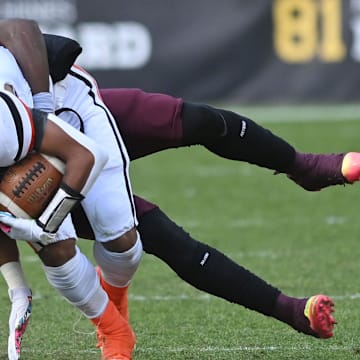 Beaver Falls' Trey Singleton is tackled by Steel Valley's Da'ron Barksdale during Friday's Class 2A WPIAL championship game at Acrisure Stadium.

Beaver Falls Loses To Steel Valley