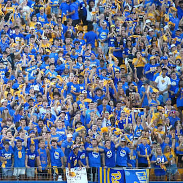 Pittsburgh Panthers student section erupts after they display the Panthers 2021 ACC Championship banner during the first half of the Backyard Brawl against West Virginia at Acrisure Stadium in Pittsburgh, PA on September 1, 2022.

Pitt Vs West Virginia Backyard Brawl