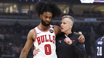 Jan 10, 2025; Chicago, Illinois, USA; Chicago Bulls head coach Billy Donovan talks to guard Coby White (0) during the first half of a basketball game against the Washington Wizards at United Center. Mandatory Credit: Kamil Krzaczynski-Imagn Images