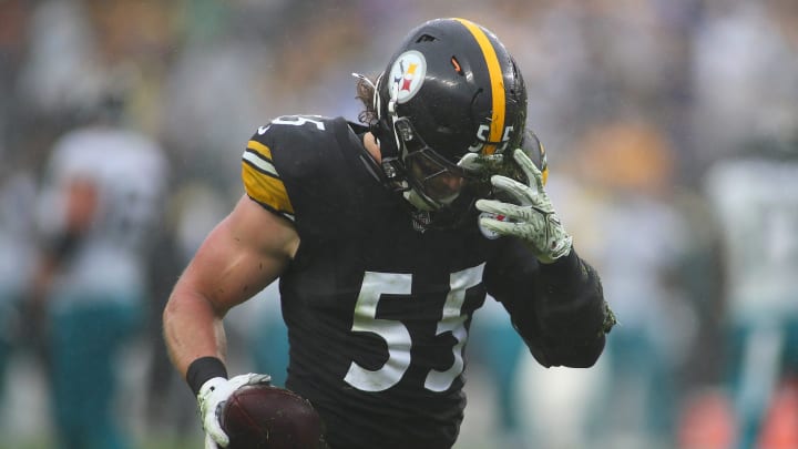 Pittsburgh Steelers Cole Holcomb pulls dirt out of his helmet after recovering a fumble during the first half against the Jacksonville Jaguars at Acrisure Stadium in Pittsburgh, PA on October 29, 2023.