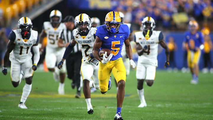 Jared Wayne (5) of the Pittsburgh Panthers sprints downfield after getting a breakaway during the second half of the Backyard Brawl against the West Virginia Mountaineers at Acrisure Stadium in Pittsburgh, PA on September 1, 2022.

Pitt Vs West Virginia Backyard Brawl