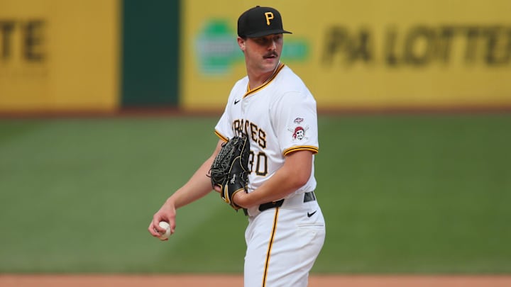 Pirates pitcher Paul Skenes eyes up the runner on first base during his MLB debut.