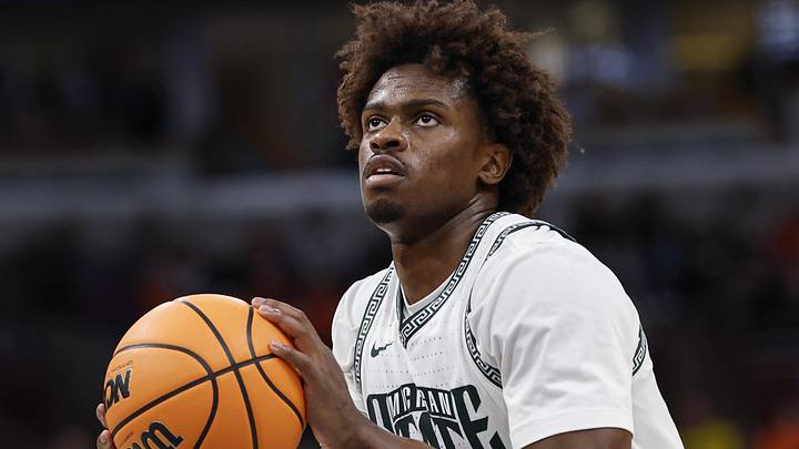 Mar 13, 2026; Chicago, IL, USA; Michigan State Spartans forward Coen Carr (55) shoots a free throw against the UCLA Bruins during the second half at United Center. Mandatory Credit: Kamil Krzaczynski-Imagn Images