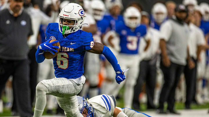 Bishop Gorman earned a forfeit win Friday night after players on the bench from Lone Peak came on the field.