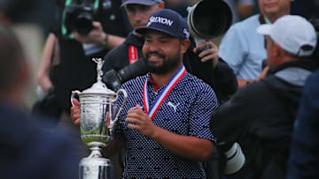 J.J. Spaun carries around his trophy while celebrating his US Open Championship win at Oakmont Country Club in Oakmont, PA on June 15, 2025.