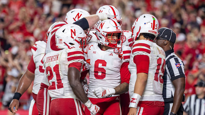 Nebraska players celebrate with wide receiver Dane Key after Key's 3-yard touchdown catch put the Huskers up 19-10 against Cincinnati. Nebraska players celebrate with wide receiver Dane Key after Key's 3-yard touchdown catch put the Huskers up 19-10 against Cincinnati.