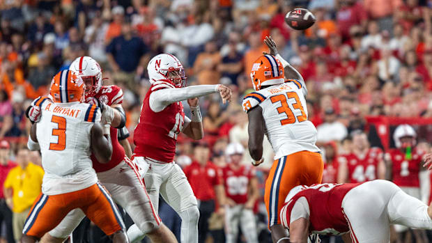 Nebraska quarterback Dylan Raiola throws a fourth-quarter pass against Illinois.