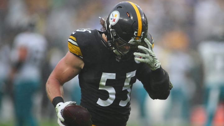 Pittsburgh Steelers Cole Holcomb pulls dirt out of his helmet after recovering a fumble during the first half against the Jacksonville Jaguars at Acrisure Stadium in Pittsburgh, PA on October 29, 2023.