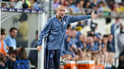 Jul 30, 2024; Orlando, FL, USA; Manchester City head coach Pep Guardiola directs his team against Barcelona in the first half  during a Champions Tour friendly match at Camping World Stadium. Mandatory Credit: Nathan Ray Seebeck-Imagn Images