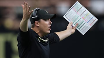 New Orleans Saints head coach Kellen Moore expresses his displeasure at a call in a game against the New York Giants on Oct. 12, 2025. 